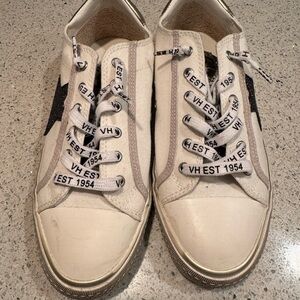 White Sneakers with Black Star Detail